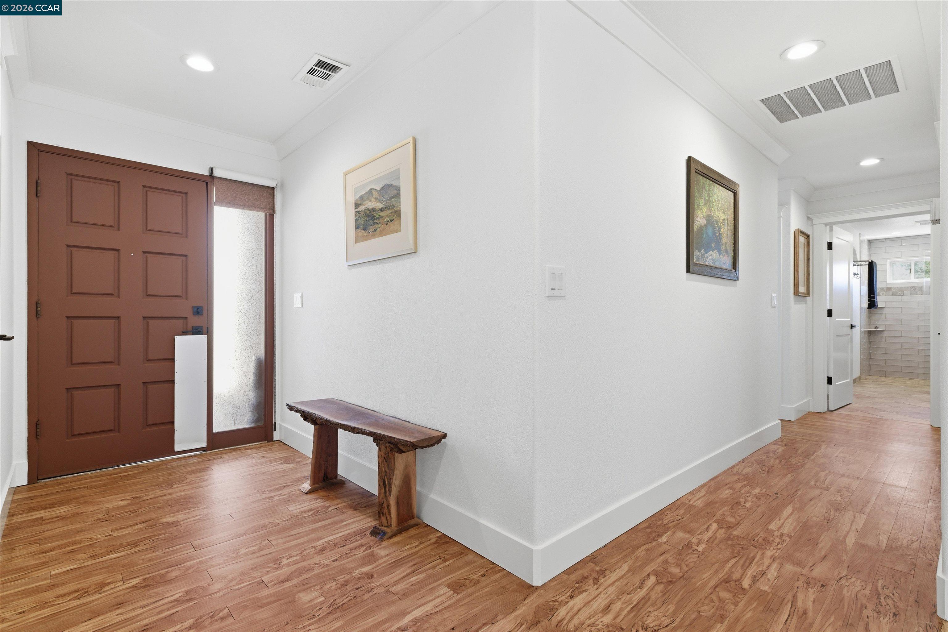 9530 Morgan Territory Road Livermore, CA 94551 - Photo 16 of 55 a view of a hallway with wooden floor and entryway