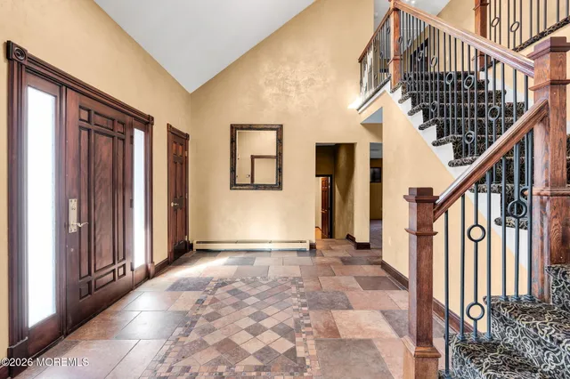 a view of front door with stairs