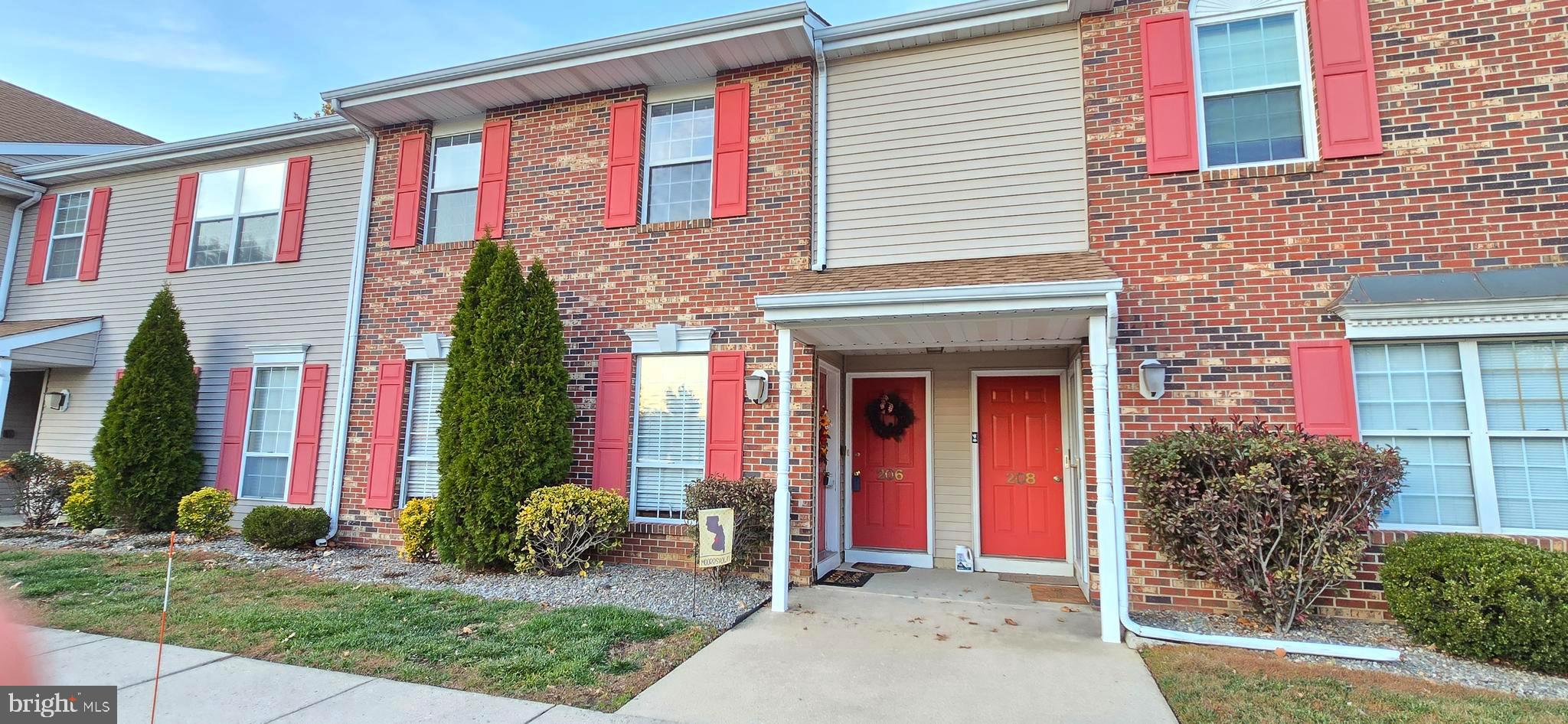 206 Crider Avenue Moorestown, NJ 08057 - Photo 1 of 20 a front view of multi story residential apartment building with yard