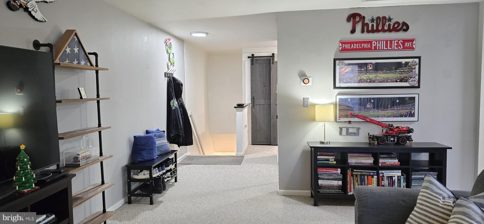 206 Crider Avenue Moorestown, NJ 08057 - Photo 12 of 20 a view of a hallway with couch and a workspace