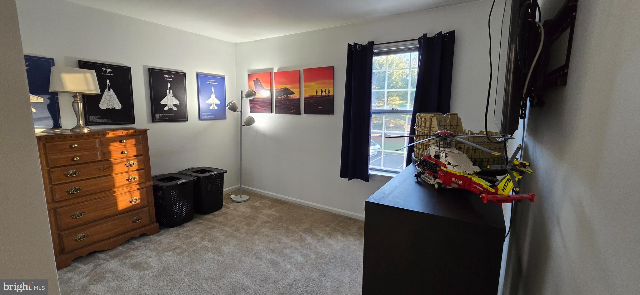206 Crider Avenue Moorestown, NJ 08057 - Photo 16 of 20 a view of a workspace with furniture and a flat screen tv