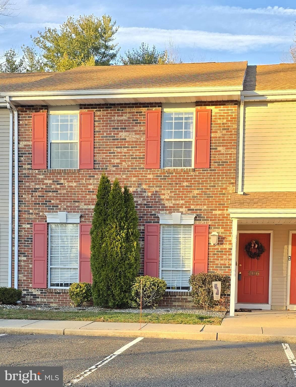 206 Crider Avenue Moorestown, NJ 08057 - Photo 3 of 20 front view of a brick house with a yard