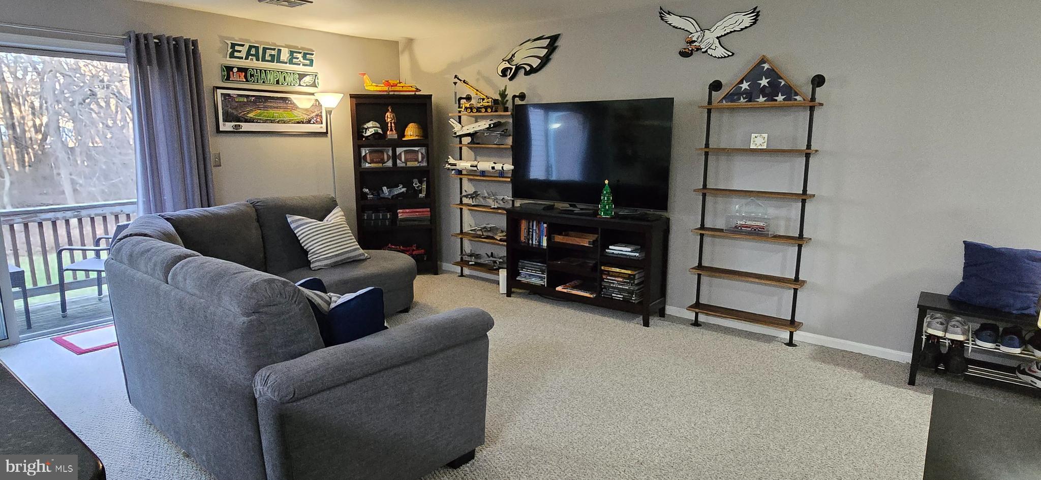 206 Crider Avenue Moorestown, NJ 08057 - Photo 6 of 20 a living room with furniture a ceiling fan and a window