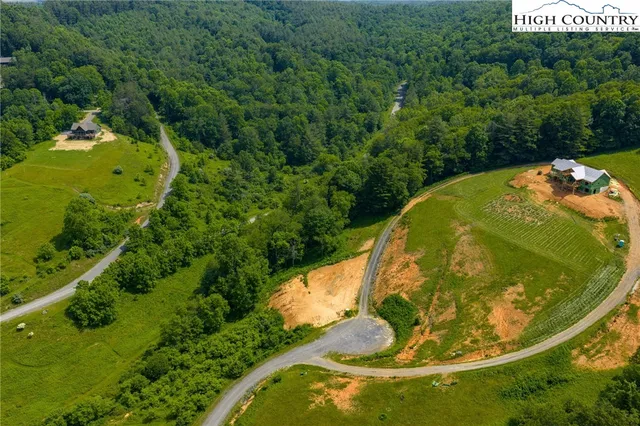 an aerial view of a swimming pool
