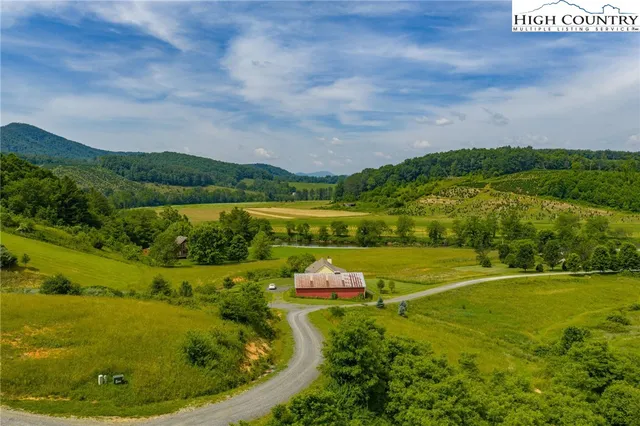 a view of a lake with a big yard