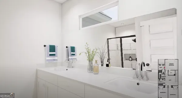 a bathroom with double vanity sink and a mirror