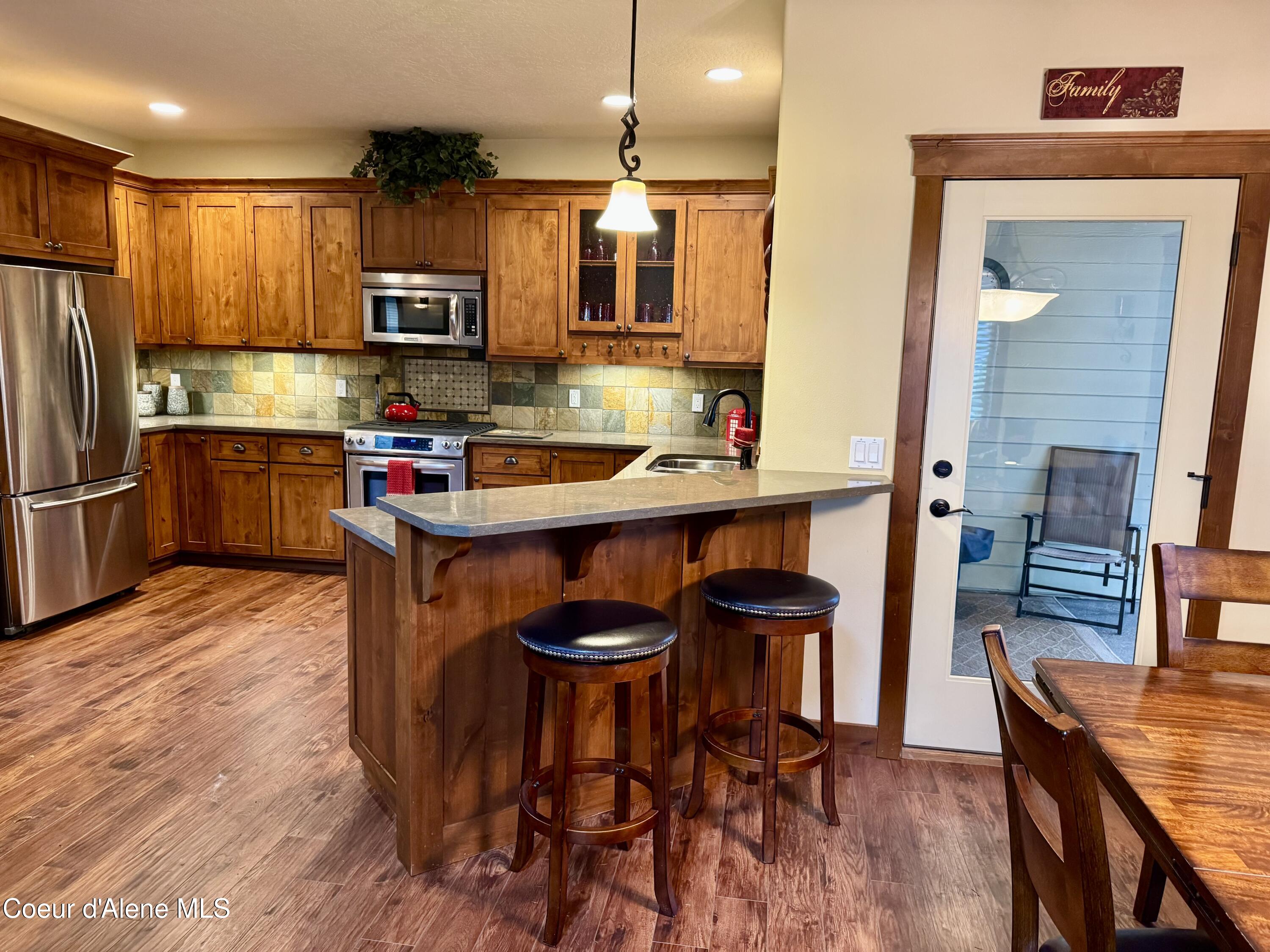 9157 Piper Court Hayden, ID 83835 - Photo 25 of 53 Door to covered Back Porch