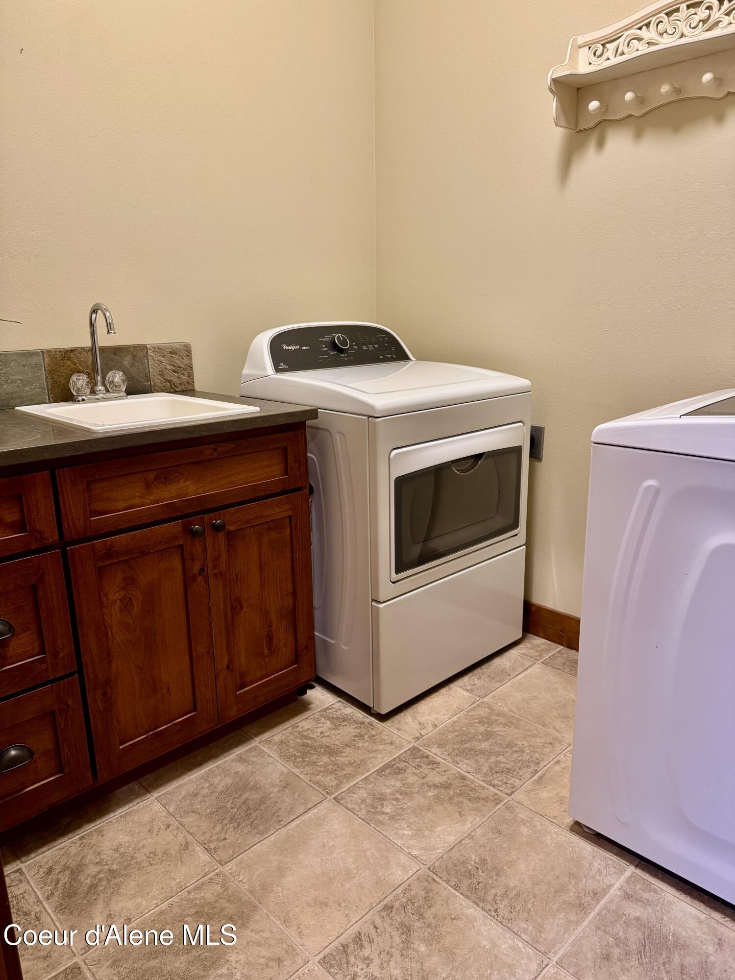 9157 Piper Court Hayden, ID 83835 - Photo 29 of 53 Main Floor Laundry
