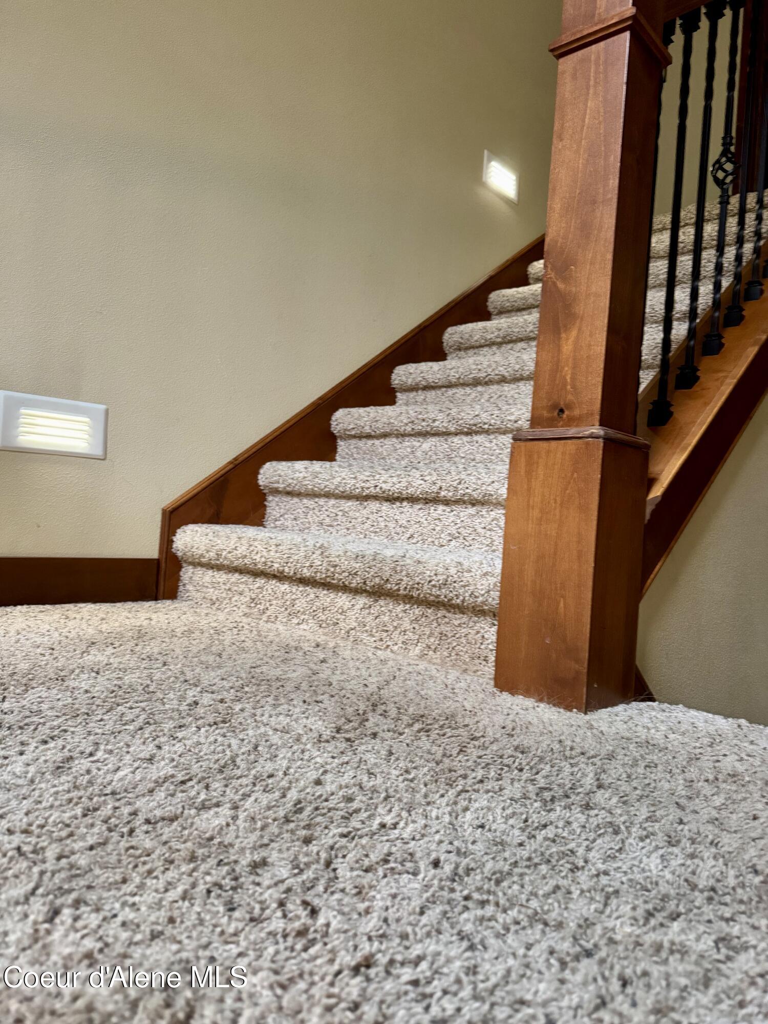 9157 Piper Court Hayden, ID 83835 - Photo 32 of 53 Stairs with wall lighting