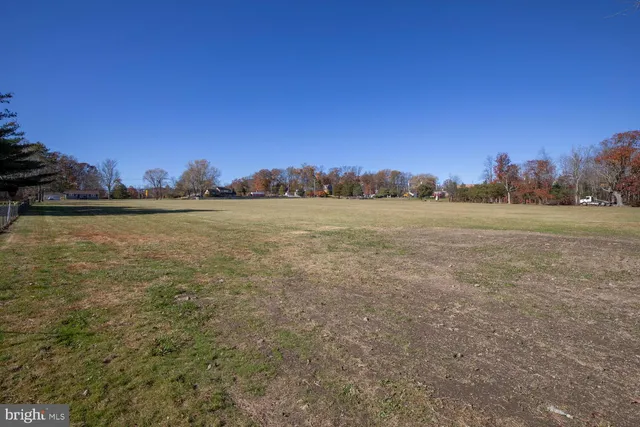 a view of an ocean with a mountain in the background