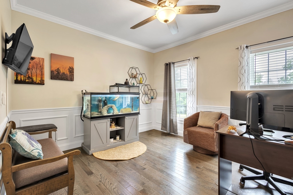 24 Old County Road Ashburnham, MA 01430 - Photo 11 of 32 a living room with furniture a flat screen tv and wooden floor