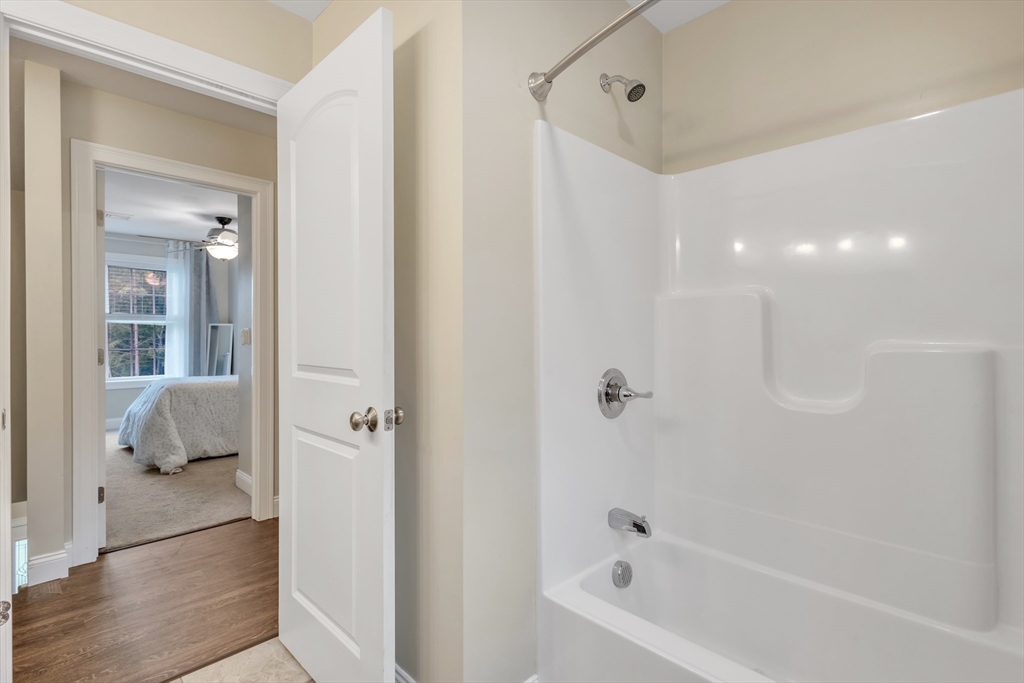 24 Old County Road Ashburnham, MA 01430 - Photo 18 of 32 a bathroom with a bathtub and a shower