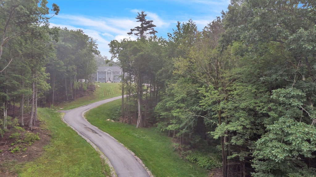 24 Old County Road Ashburnham, MA 01430 - Photo 30 of 32 a view of a garden with a pathway