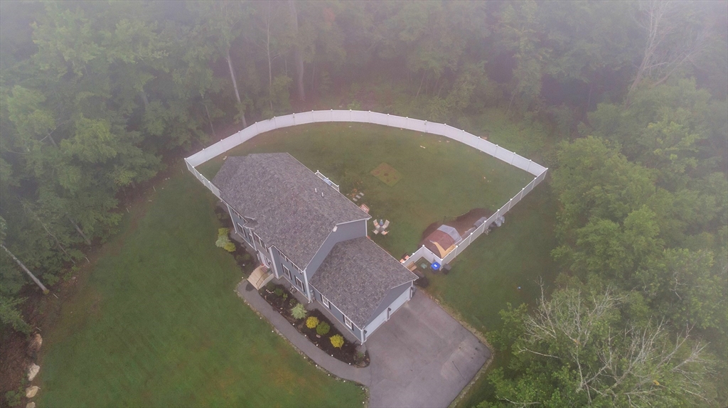 24 Old County Road Ashburnham, MA 01430 - Photo 32 of 32 a aerial view of a house with a yard and large tree