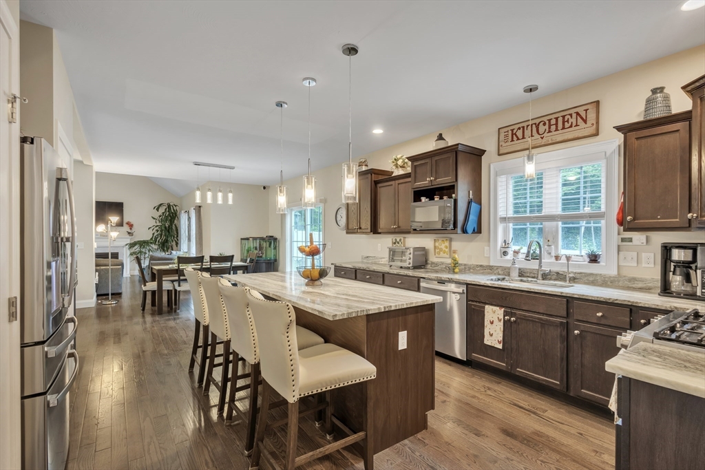24 Old County Road Ashburnham, MA 01430 - Photo 6 of 32 a large kitchen with a table and chairs