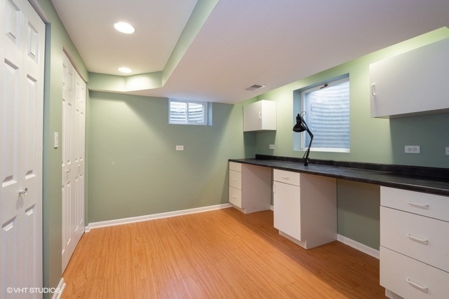 546 North Rohlwing Road Palatine, IL 60074 - Photo 16 of 17 a kitchen with a sink and cabinets