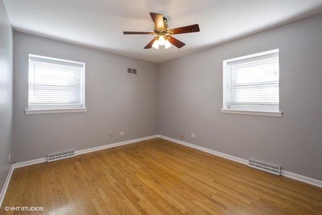 546 North Rohlwing Road Palatine, IL 60074 - Photo 10 of 17 a view of an empty room with a window