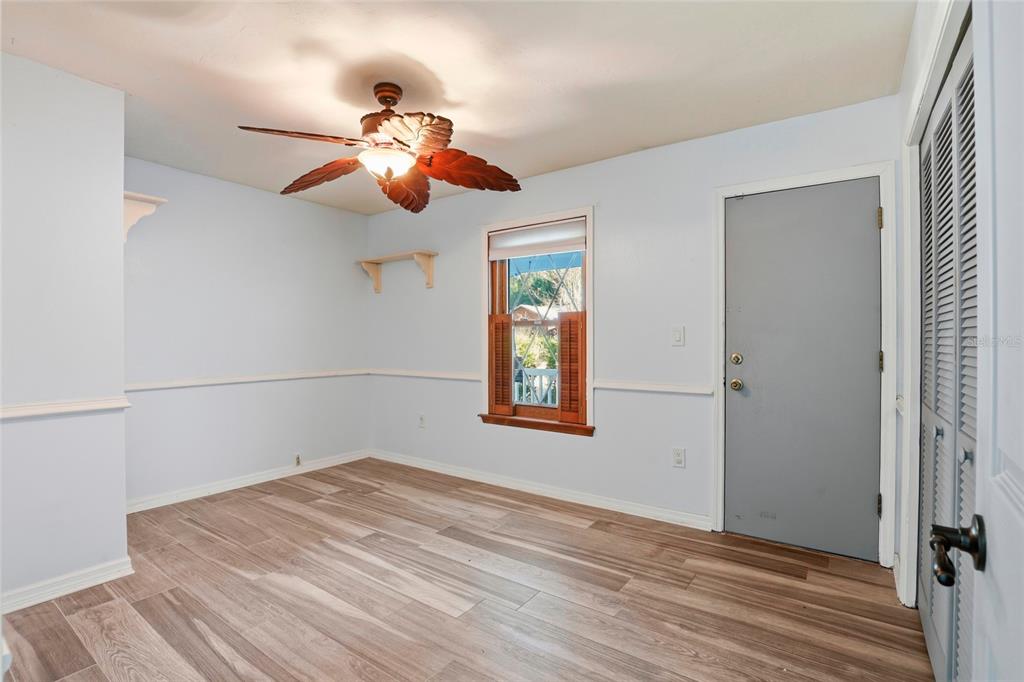 10808 Northwest 31st Place Gainesville, FL 32606 - Photo 22 of 38 a view of a room with wooden floor