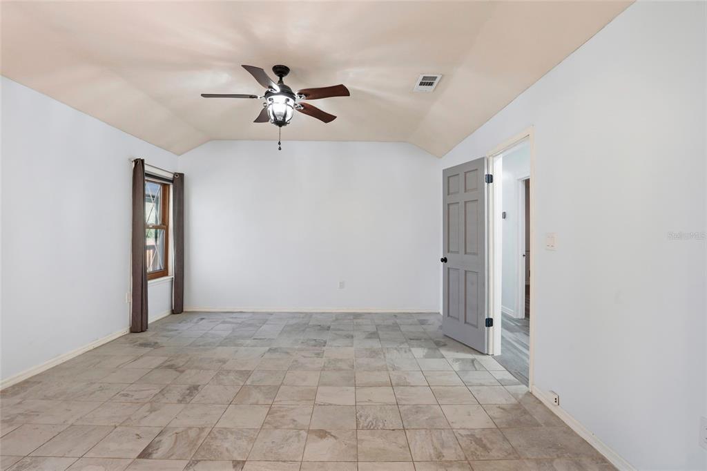 10808 Northwest 31st Place Gainesville, FL 32606 - Photo 24 of 38 a view of an empty room