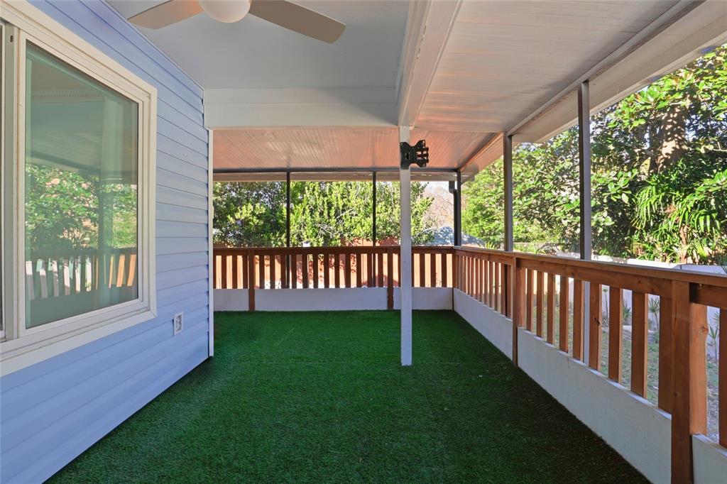 10808 Northwest 31st Place Gainesville, FL 32606 - Photo 27 of 38 a view of a porch with a yard