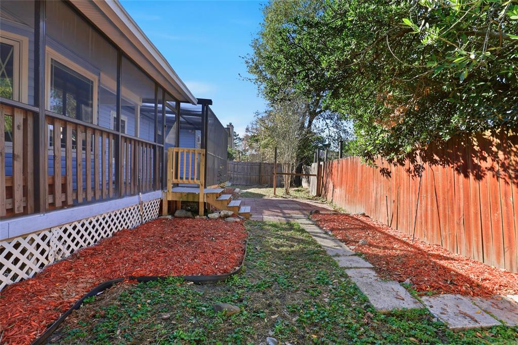 10808 Northwest 31st Place Gainesville, FL 32606 - Photo 31 of 38 a house view with a garden space