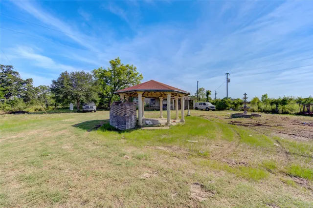 a house with trees in front of it