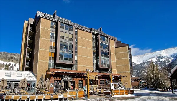 a front view of a building with street view