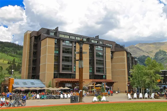 a front view of building with yard