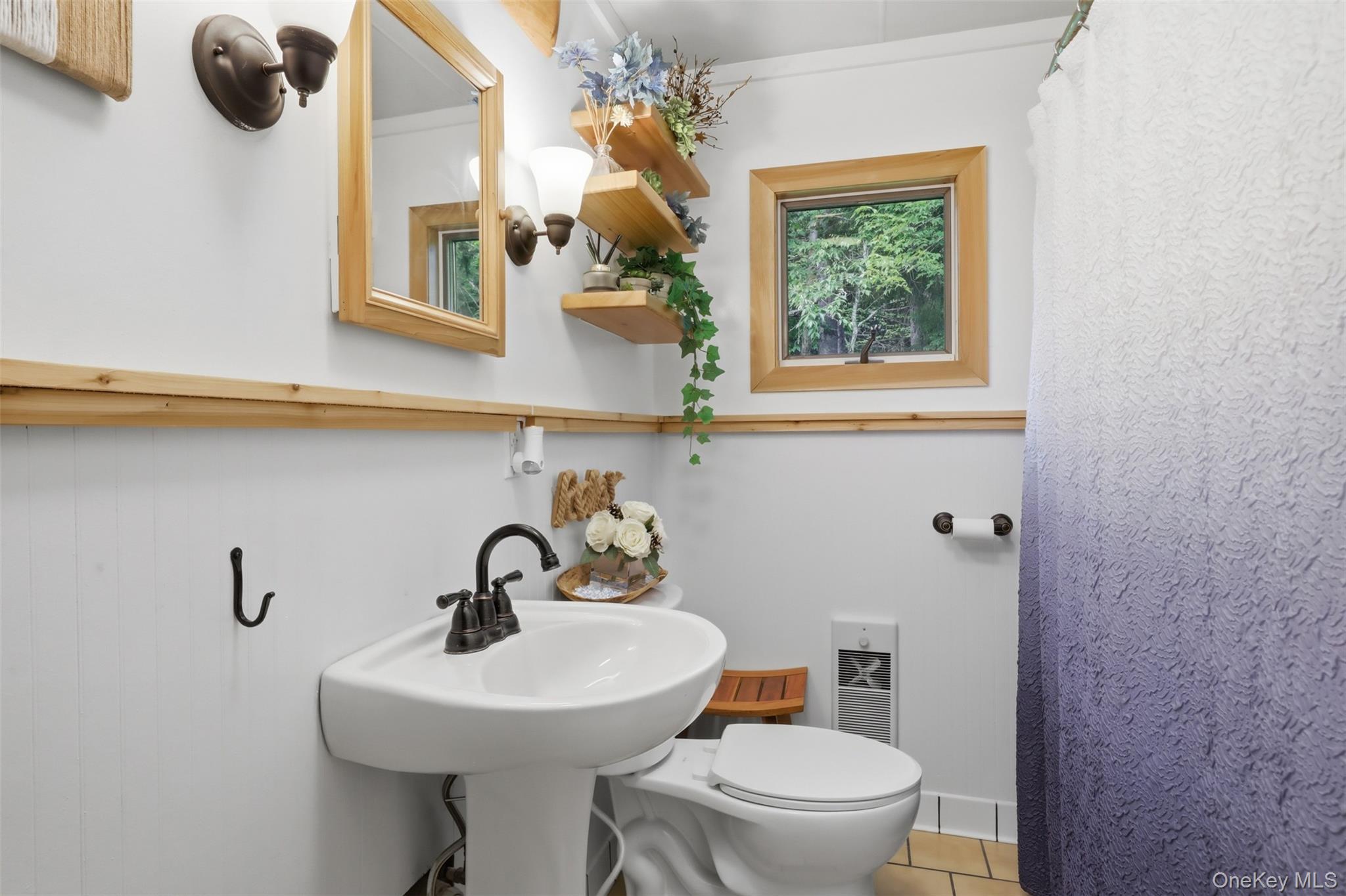 115 Cold Spring Road Liberty, NY 12754 - Photo 11 of 35 Updated Bright, updated full bathroom. Newer 55 gallon water tank and whole house water filtration system.