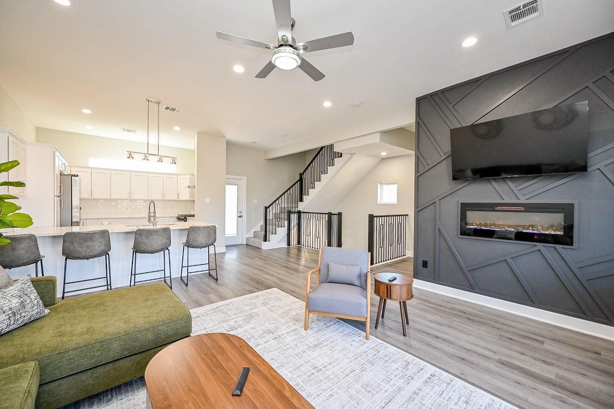 4746 Mallow Street Houston, TX 77033 - Photo 1 of 38 Spacious main living area with high ceilings and seamless flow to the kitchen.