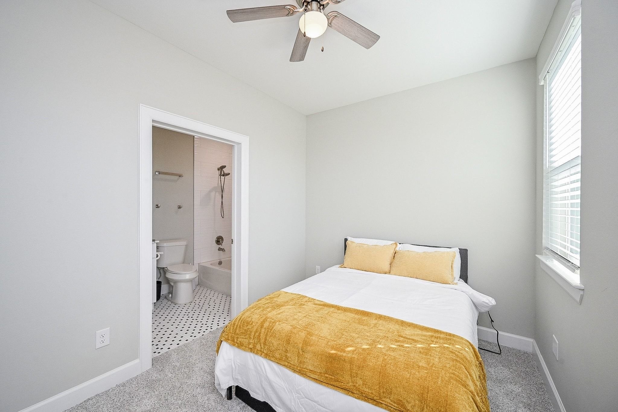 4746 Mallow Street Houston, TX 77033 - Photo 13 of 38 Comfortable first floor bedroom with ensuite.