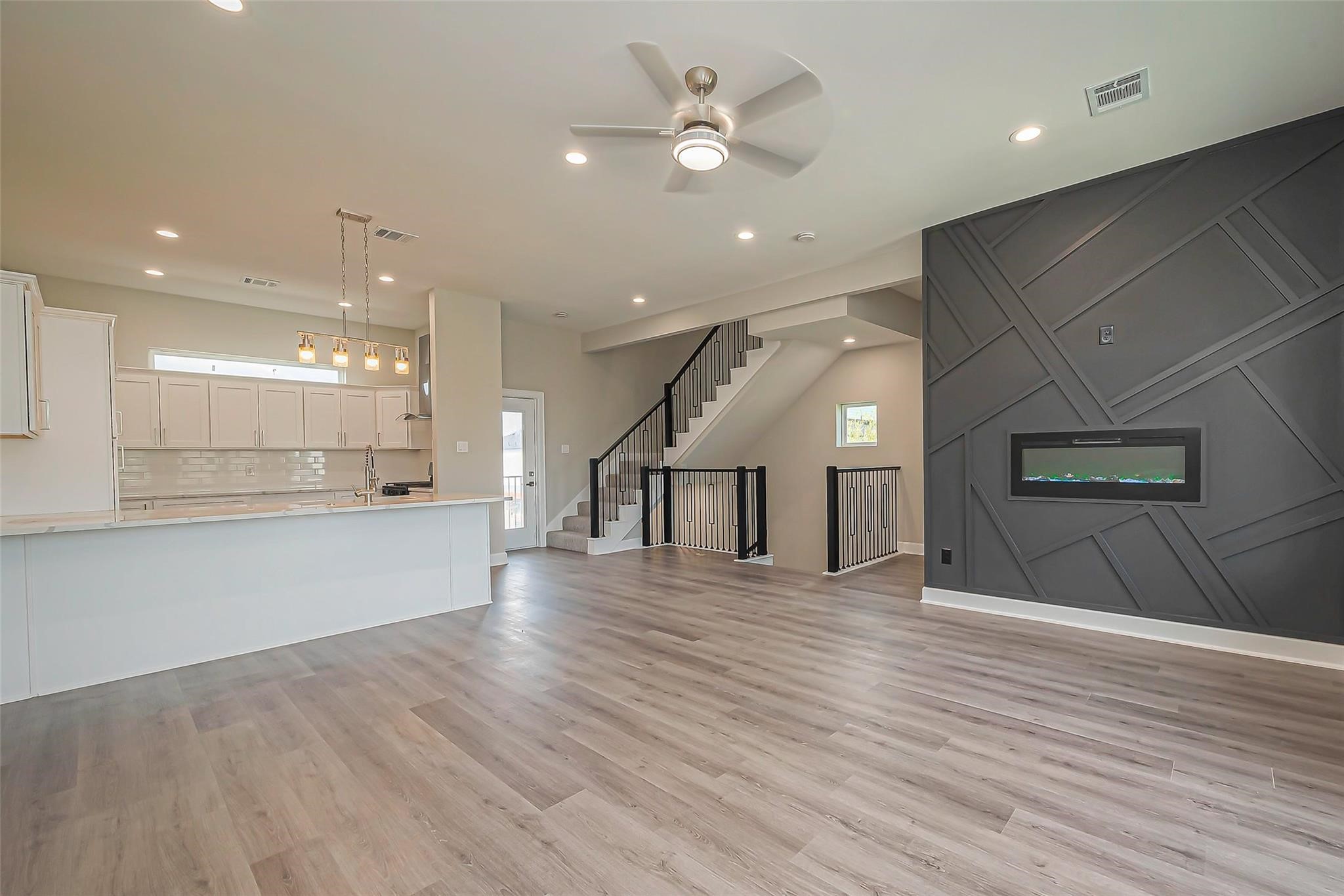 4746 Mallow Street Houston, TX 77033 - Photo 21 of 38 Unit 2: Spacious living room open to kitchen.