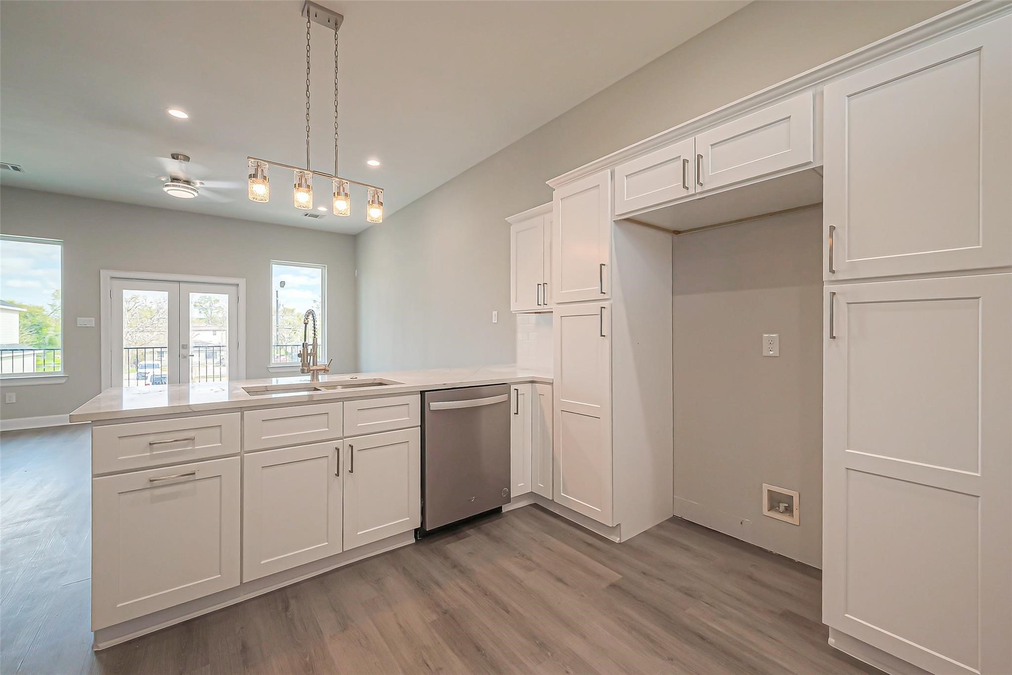 4746 Mallow Street Houston, TX 77033 - Photo 25 of 38 Unit 2: Kitchen peninsula open to living area.