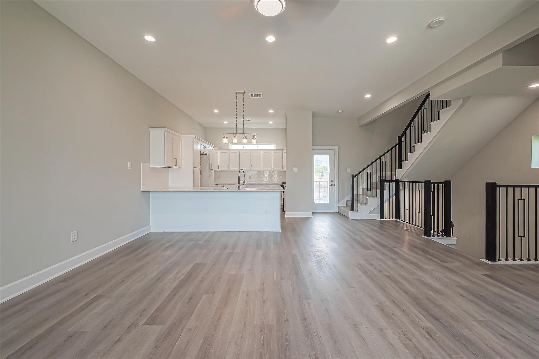 4746 Mallow Street Houston, TX 77033 - Photo 30 of 38 Unit 2: spacious main floor with living room and kitchen.