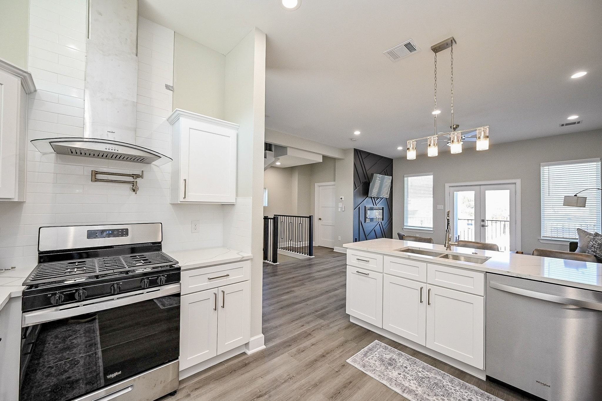 4746 Mallow Street Houston, TX 77033 - Photo 3 of 38 Bright contemporary kitchen with clean finishes and ample prep space for everyday living.