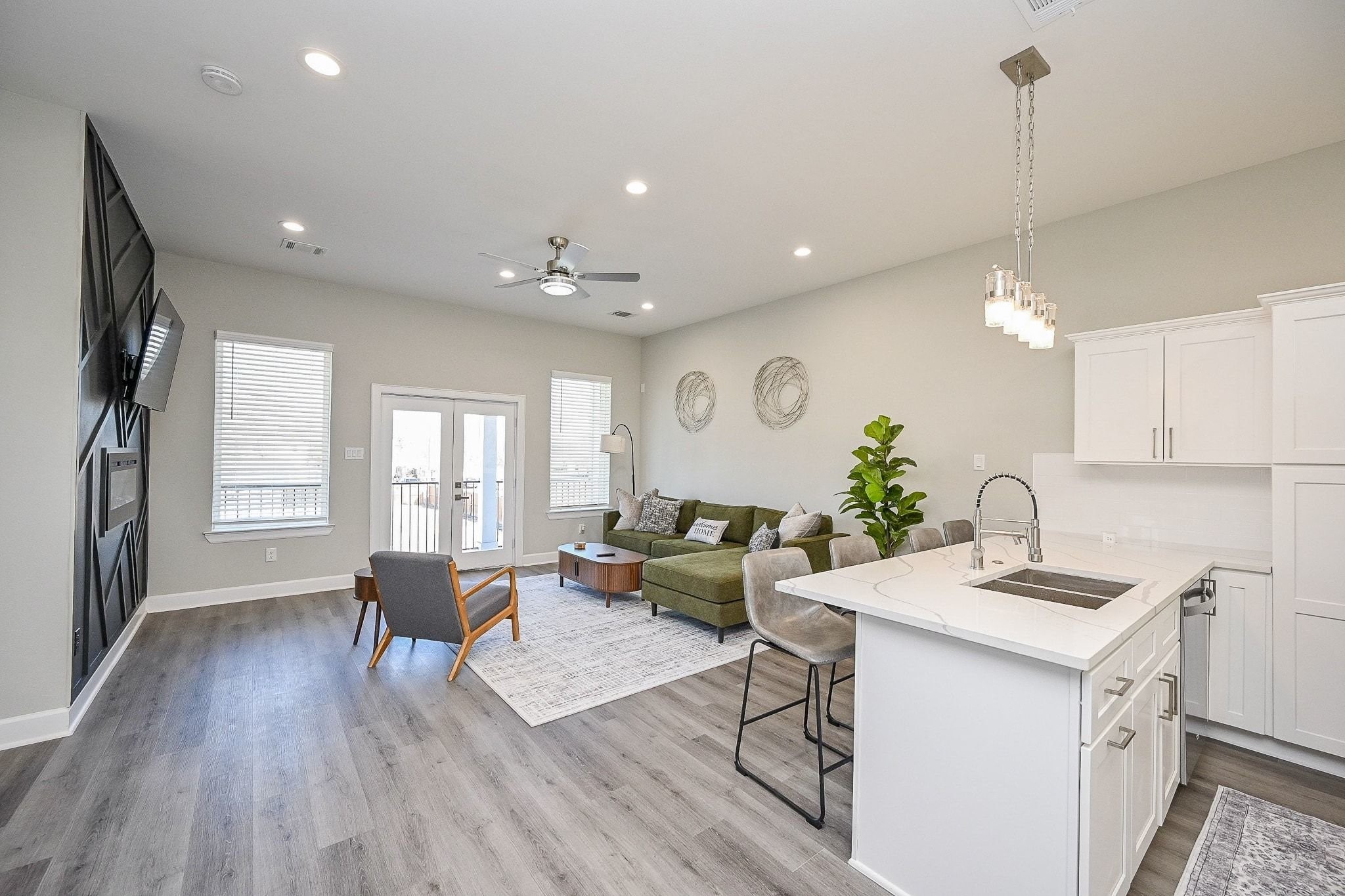 4746 Mallow Street Houston, TX 77033 - Photo 4 of 38 Bright and airy living room with modern finishes and an open, welcoming layout.