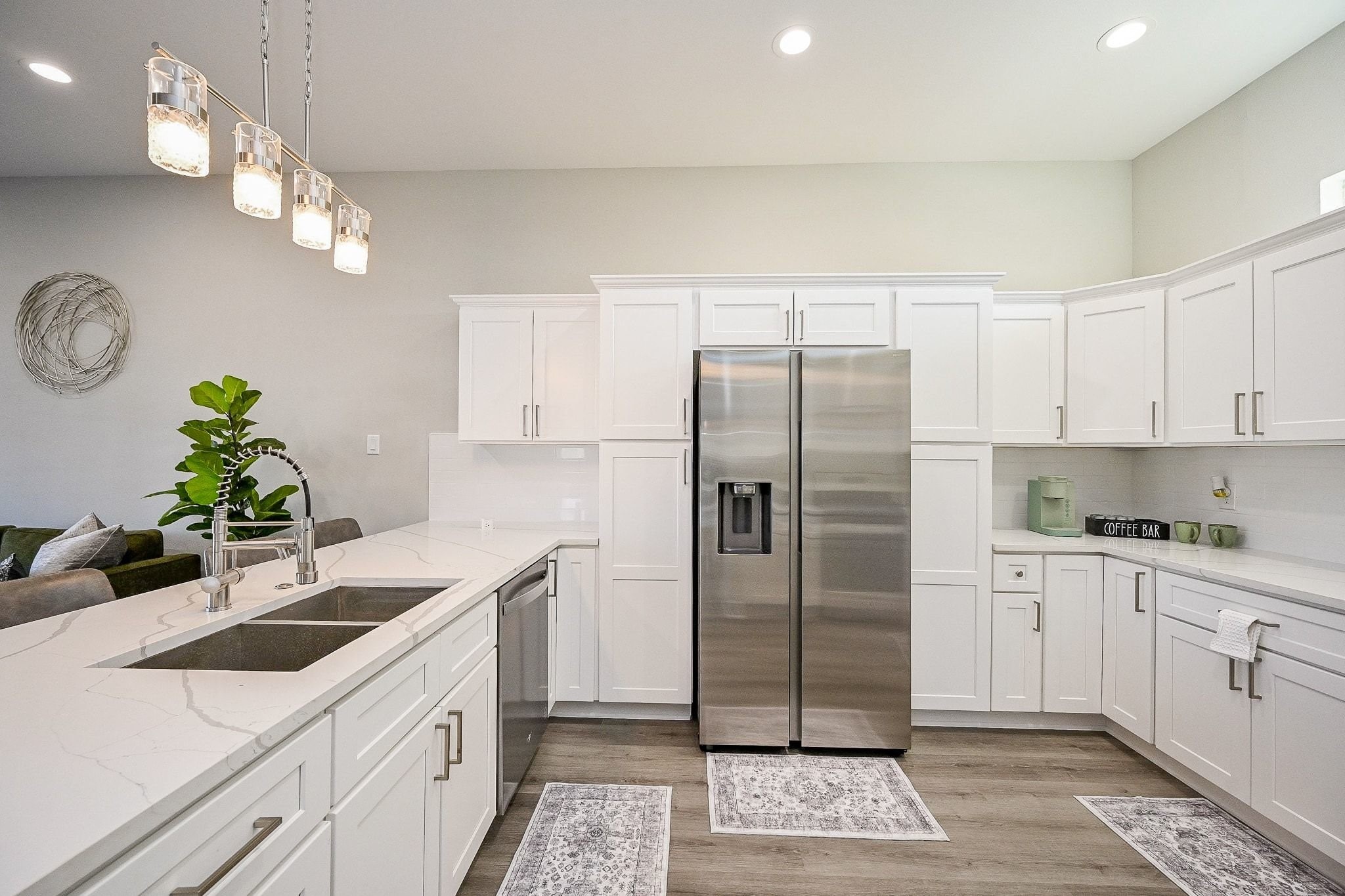 4746 Mallow Street Houston, TX 77033 - Photo 6 of 38 Open kitchen with pristine quartz countertops.