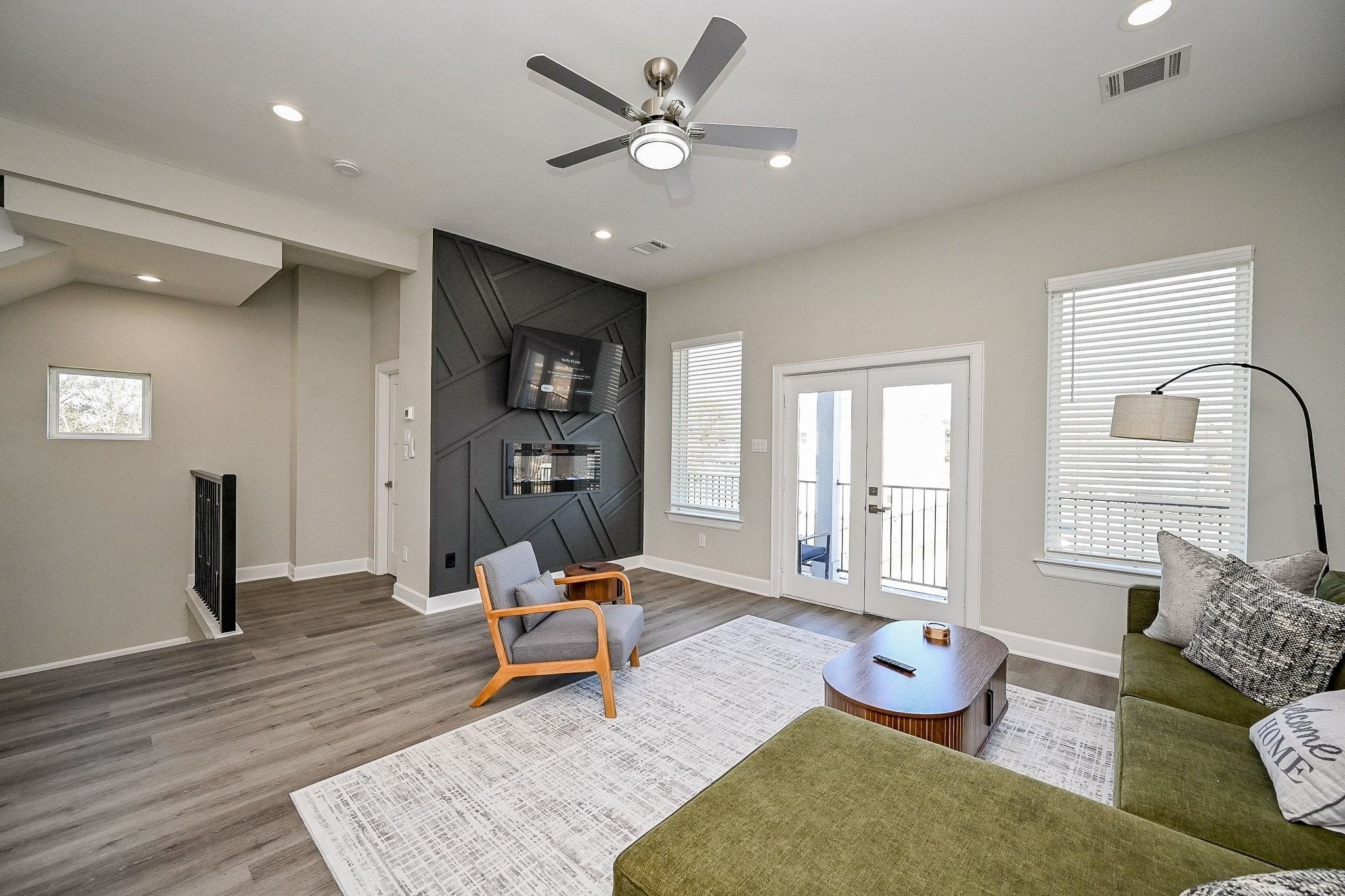 4746 Mallow Street Houston, TX 77033 - Photo 7 of 38 Bright and airy living room with modern finishes and an open, welcoming layout.