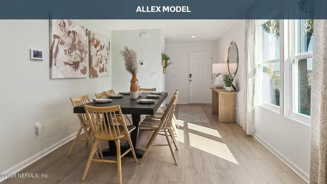 a kitchen with stainless steel appliances granite countertop a stove a sink dishwasher and a microwave oven with wooden floor