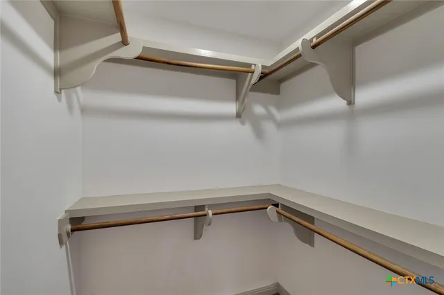 a view of a room with racks on the wall