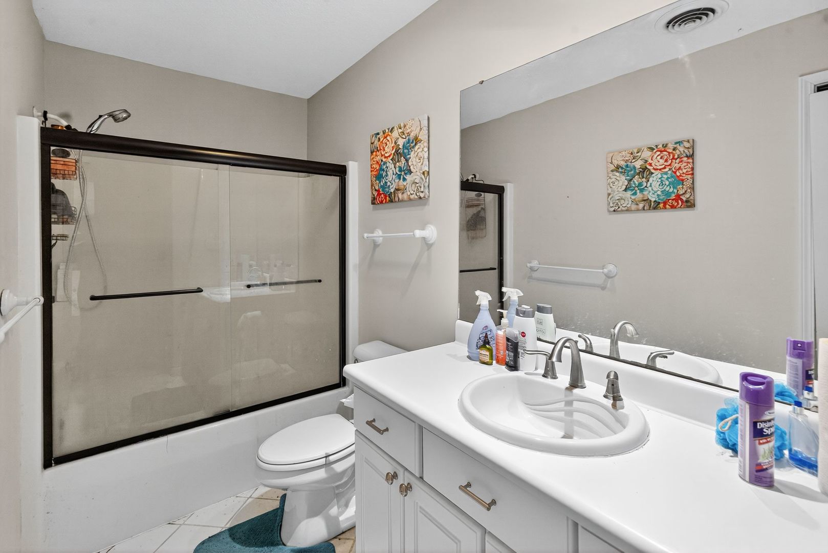 302 Jay Street Savoy, IL 61874 - Photo 12 of 16 a bathroom with a sink toilet and shower