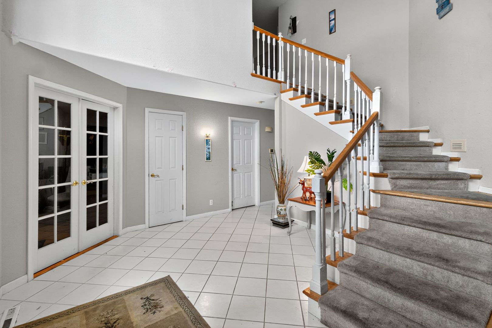 302 Jay Street Savoy, IL 61874 - Photo 3 of 16 a view of entryway and hall with wooden floor