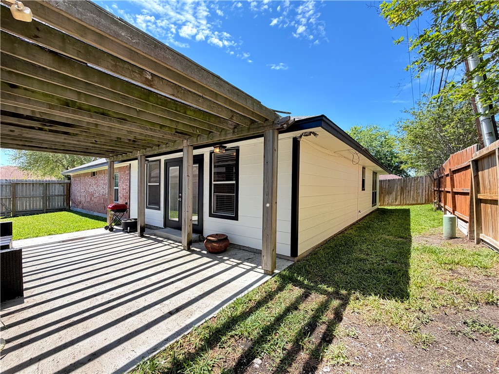 4214 Valley Circle Corpus Christi, TX 78413 - Photo 22 of 28 a view of a backyard of the house