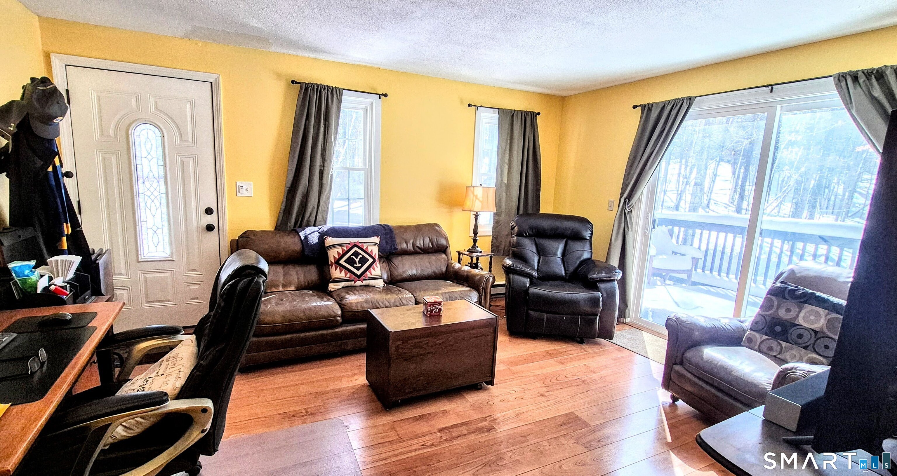 239 Old Farms Road, Unit 15C Avon, CT 06001 - Photo 12 of 29 a living room with furniture and a large window