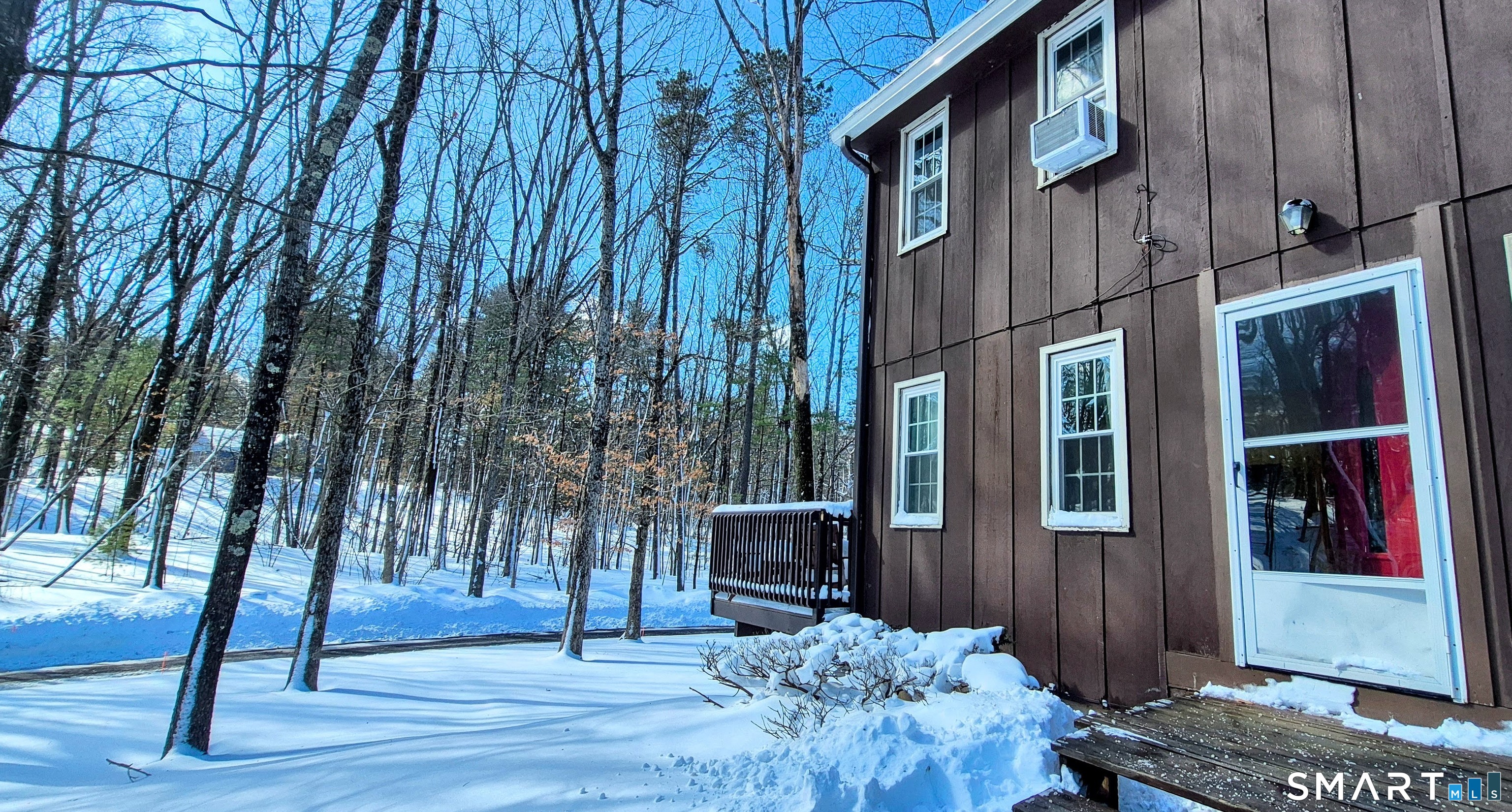 239 Old Farms Road, Unit 15C Avon, CT 06001 - Photo 3 of 29 a front view of a house with a yard