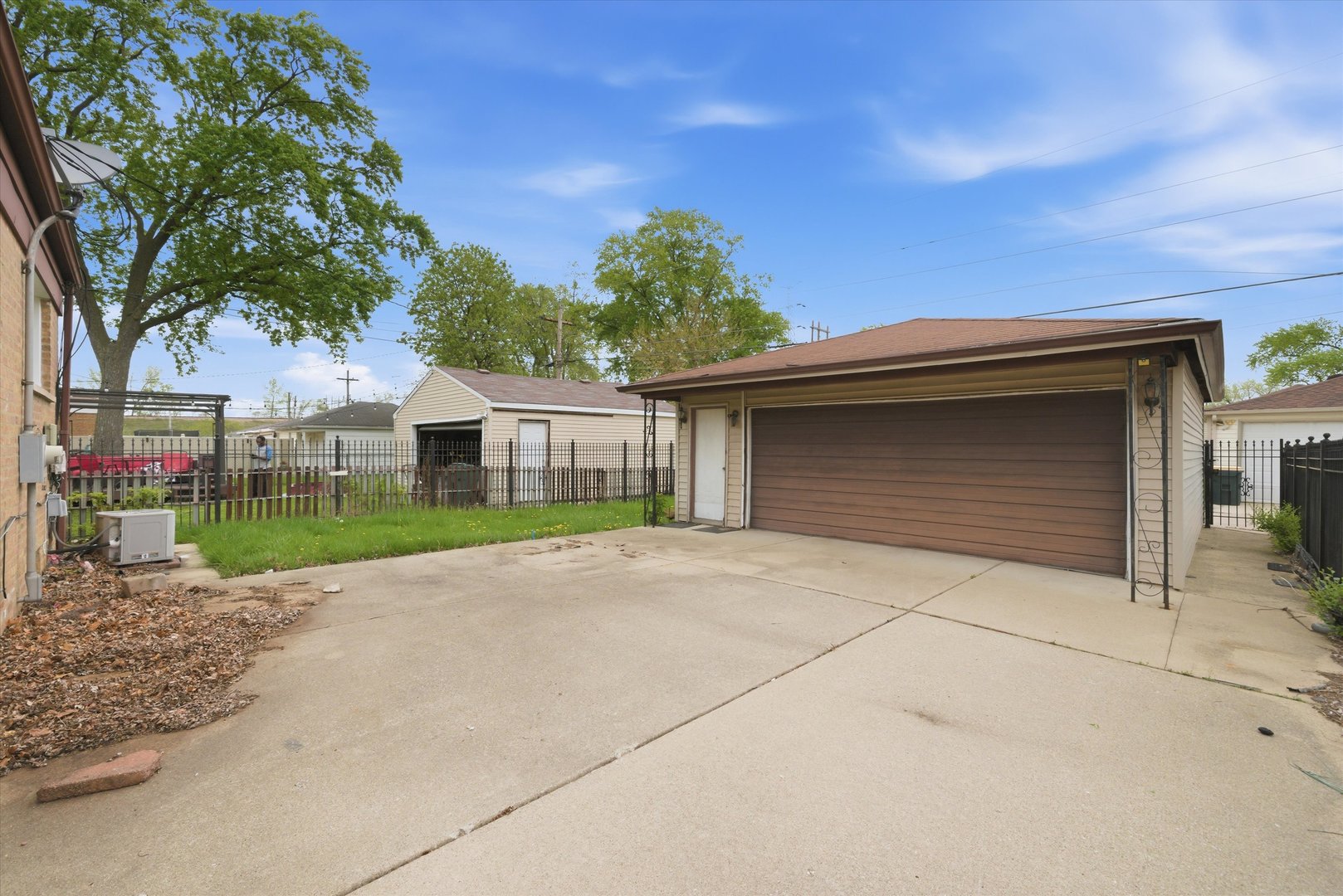 119 Rice Avenue Bellwood, IL 60104 - Photo 17 of 25 front view of a house with a garden