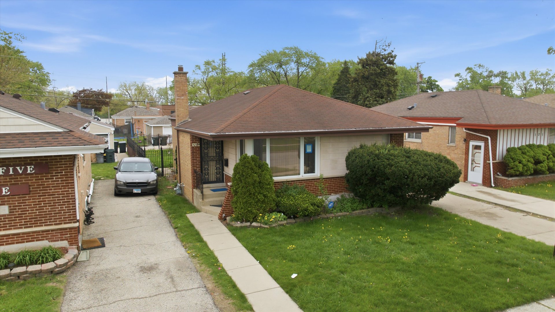 119 Rice Avenue Bellwood, IL 60104 - Photo 23 of 25 a house view with a garden space