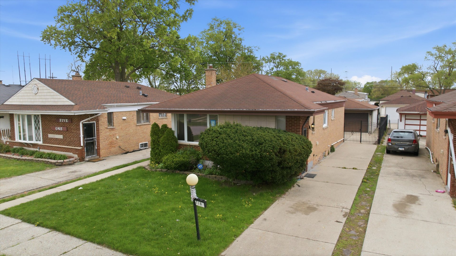 119 Rice Avenue Bellwood, IL 60104 - Photo 24 of 25 a house view with a garden space