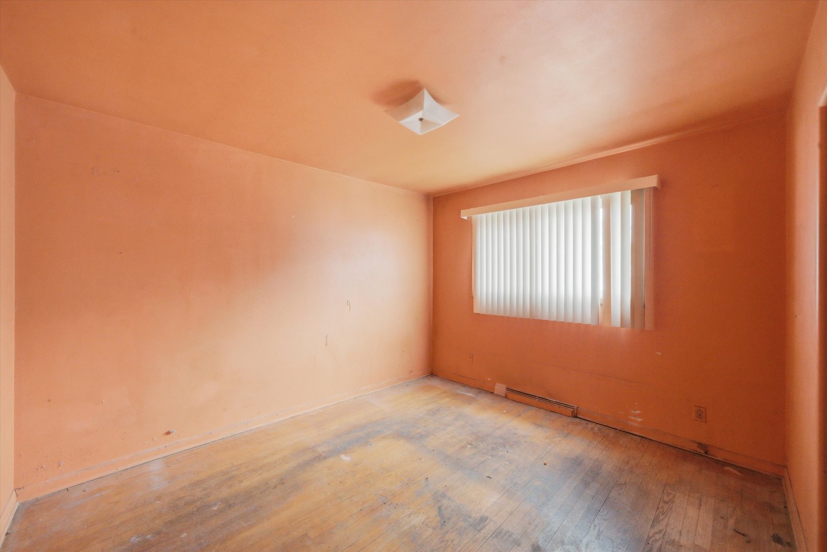 119 Rice Avenue Bellwood, IL 60104 - Photo 9 of 25 a view of an empty room with a window