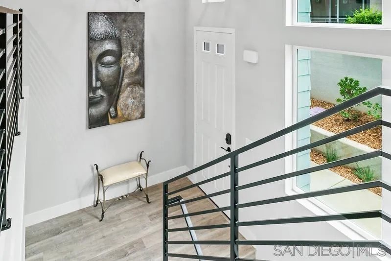 347 Oak Avenue Carlsbad, CA 92008 - Photo 23 of 34 a view of staircase with furniture and a window